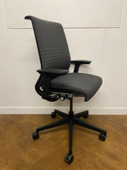 Used Steelcase Think V2 Swivel Chair in Dark Grey Ribbed Cloth