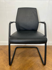 Used Sitland Passe Partout High Back Executive Meeting Chair in Black Leather with a Black Cantilever Frame.