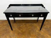 A 3 Drawer Dressing Table with Glass Top Finished in Black Lacquer.