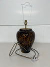 A Leopard Glass Table Lamp with Brass Finial