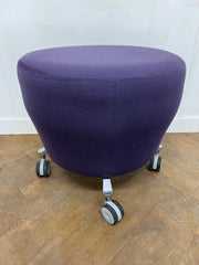 Orangebox "Points" Purple Cloth Stool on wheels.