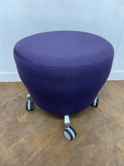 Orangebox "Points" Purple Cloth Stool on wheels.