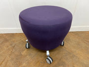 Orangebox "Points" Purple Cloth Stool on wheels.