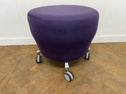 Orangebox "Points" Purple Cloth Stool on wheels.