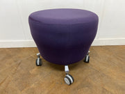Orangebox "Points" Purple Cloth Stool on wheels.