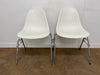 A Pair of Vintage Vitra Eames DSS White Stacking Linking Chairs
