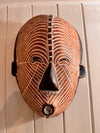 Hand-Carved Songye Kifwebe mask from the Democratic Republic of the Congo.