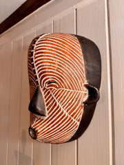 Hand-Carved Songye Kifwebe mask from the Democratic Republic of the Congo.