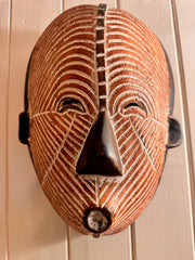 Hand-Carved Songye Kifwebe mask from the Democratic Republic of the Congo.