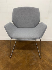 Used Boss Design Kruze Lounge Chair with Steel Sled Base Re-upholstered in Grey cloth.