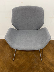 Used Boss Design Kruze Lounge Chair with Steel Sled Base Re-upholstered in Grey cloth.