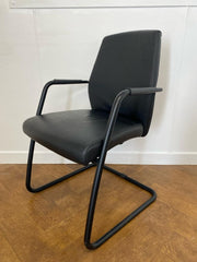 Used Sitland Passe Partout High Back Executive Meeting Chair in Black Leather with a Black Cantilever Frame.