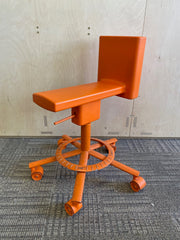 Used Magis 360 chair in Orange.